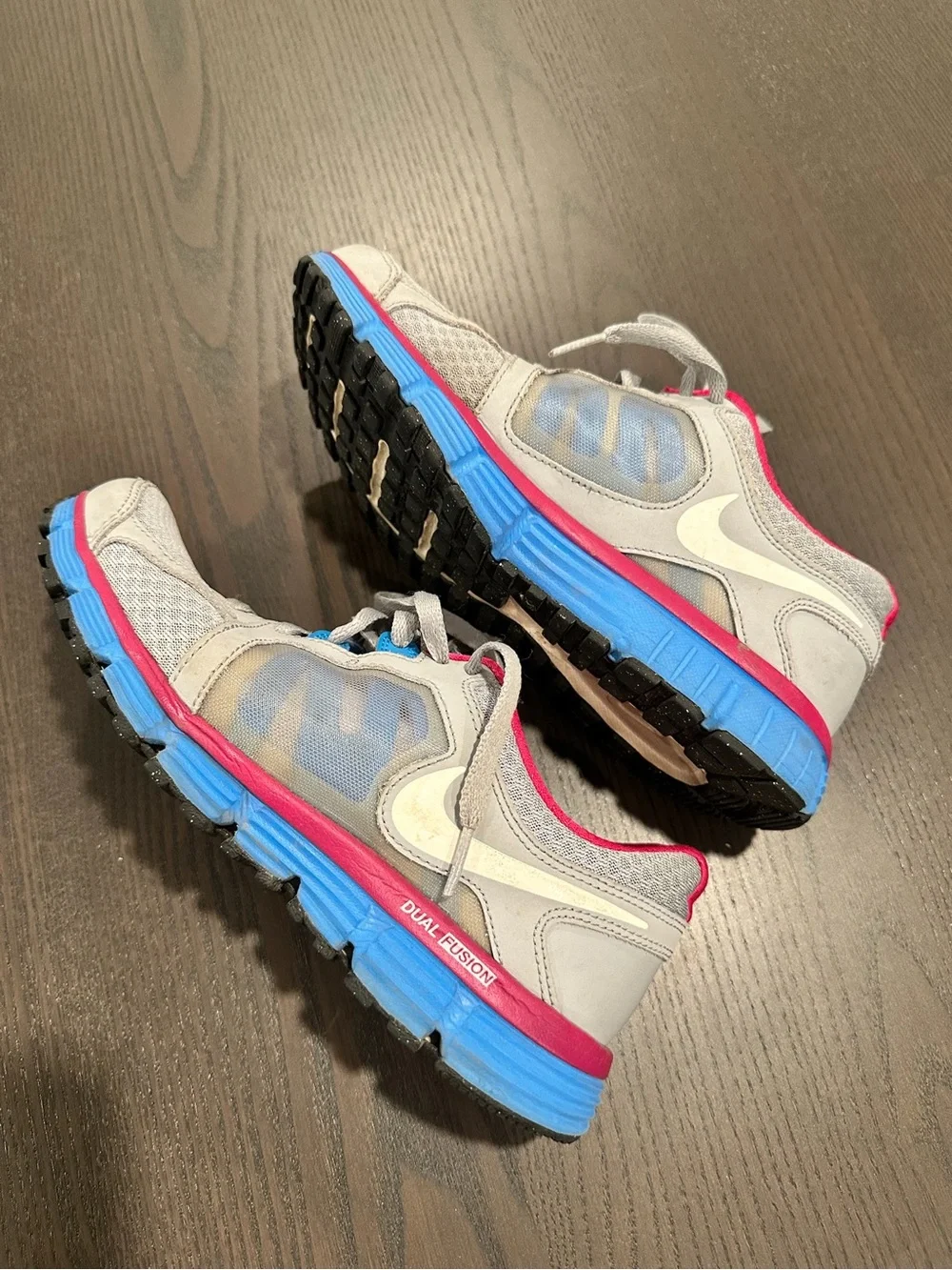 Nike Gray Sneakers with Pink Lining and Blue Accents